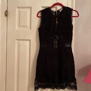Kristina Grimaldi mini black dress, semi sheer/mesh